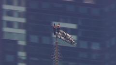Individuals Ascend Empire State Building, Display Banner, and Propose